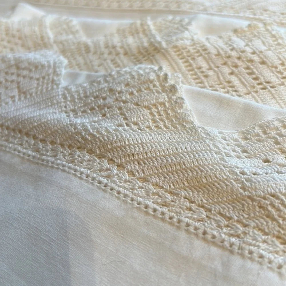 One vintage twin bed sheet w/two matching pillow cases. Never been used.